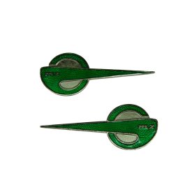 Embléma fényszóró házra pár /es150/